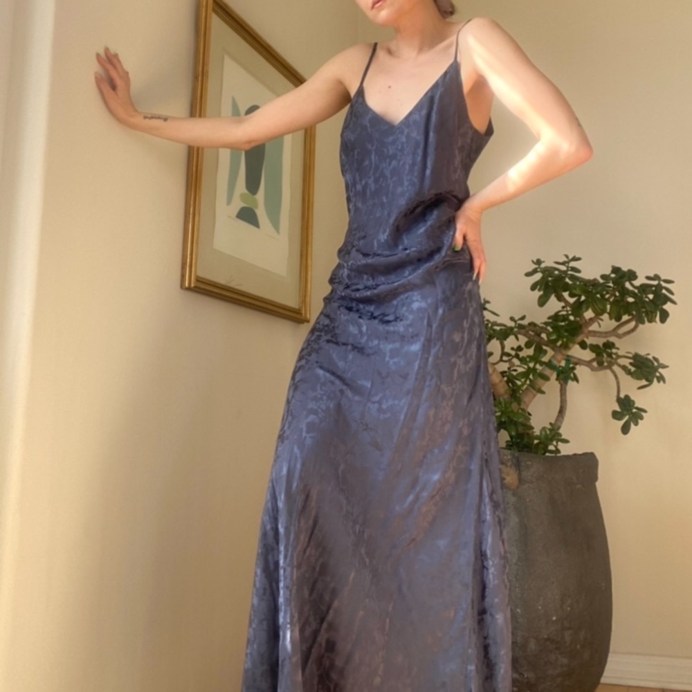 Stunning silk gown with floral pattern.